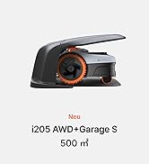 Le texte indique « Neu i205 AWD+Garage S 500 m ». Appareil électronique noir avec anneau orange, qui ressemble à un télémètre de golf ou à un appareil de mesure.