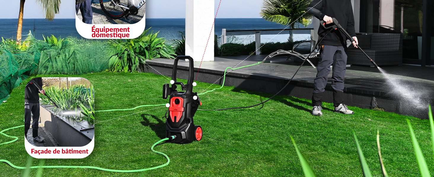utilisé sur la terrasse extérieure. Appareil rouge et noir avec tuyau pulvérisant de l'eau sur une surface en gazon artificiel.