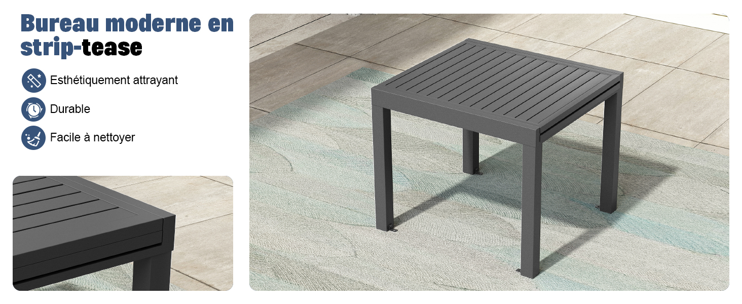 une table grise et une chaise grise sur un plancher en bois.